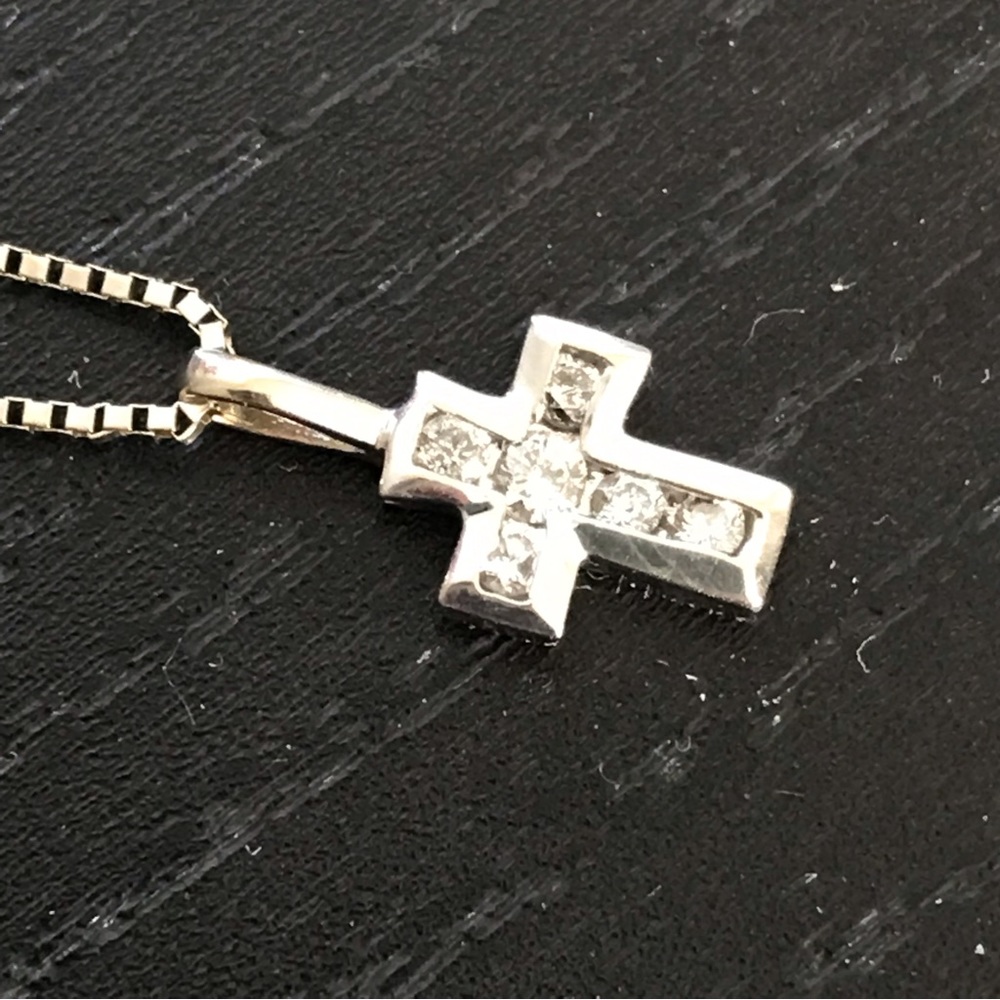 Stamped 14k white gold and Diamond pendant on an 18” 14k white gold chain.